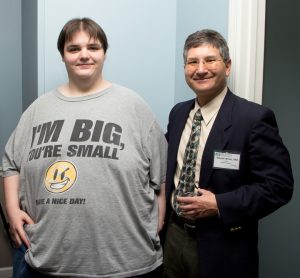 A patient with Dr. Weiss. He has already lost over 150 pounds he can easily walk and enjoys socializing with his friends.